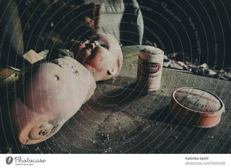 Dusty doll body on table Doll Table Attic Canned Powder lostplace urbanexplorer Deserted lost places Colour photo Broken Decline forsake sb./sth. Change Old