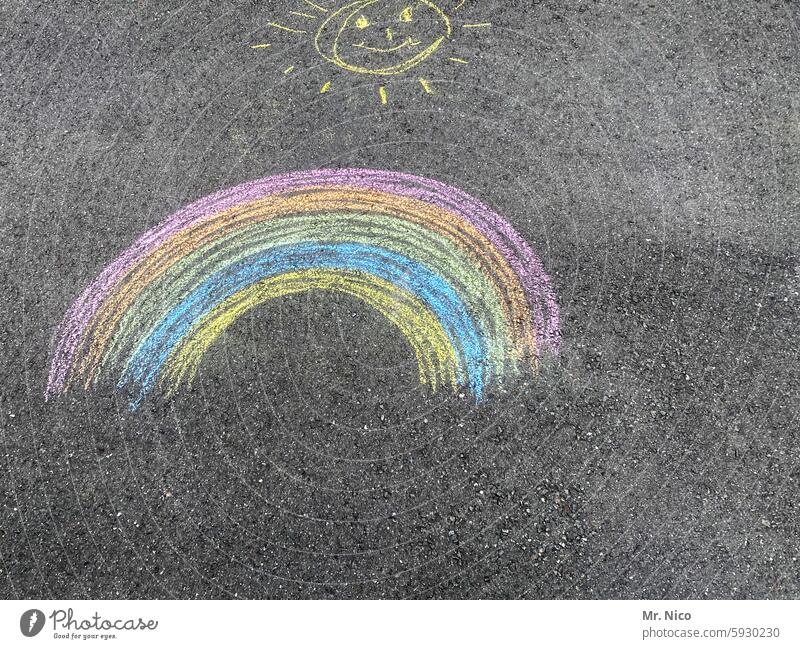 Sun and rainbow Chalk drawing Rainbow Street painting variegated Street art Painted Asphalt creatively Draw heavenly bodies Children's drawing colourful