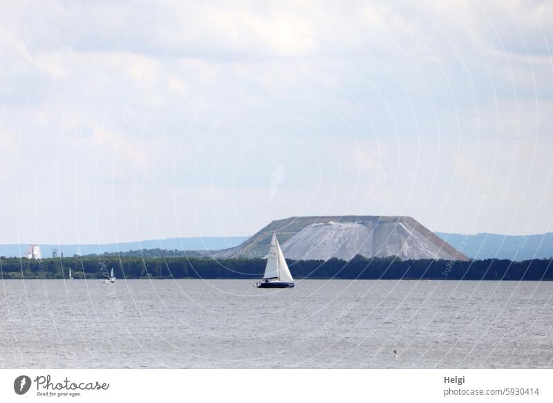 Sailing boat on the Steinhuder Meer, Monte Kali in the background Steinhuder Lake Sailboat Water salt mountain Landscape Nature Lower Saxony Exterior shot