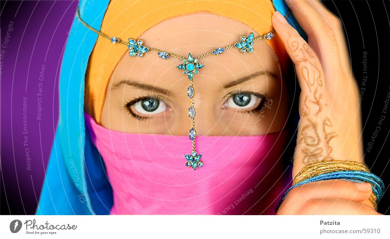Indian Princess in color Near and Middle East Woman Portrait photograph Vail Hand Jewellery Pink Violet Cyan Light blue Black Face Eyes Orange Blue tattoo