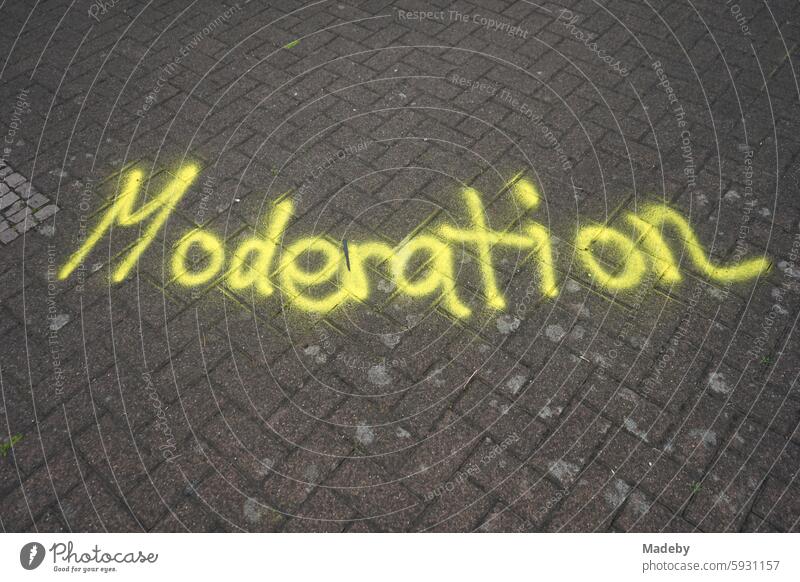 Marking in yellow of the moderation area on the paving stones of the sidewalk at the Golden Oldies event in Wettenberg Krofdorf-Gleiberg near Gießen in Hesse