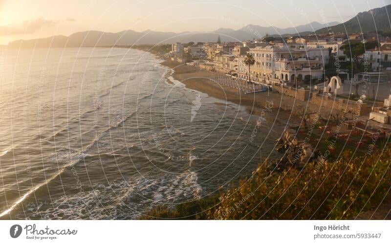 Evening view from above of the bay, the sandy beach and the old town of Sperlonga (southern Italy) Ocean Bay Sandy beach Upward Old town Exterior shot