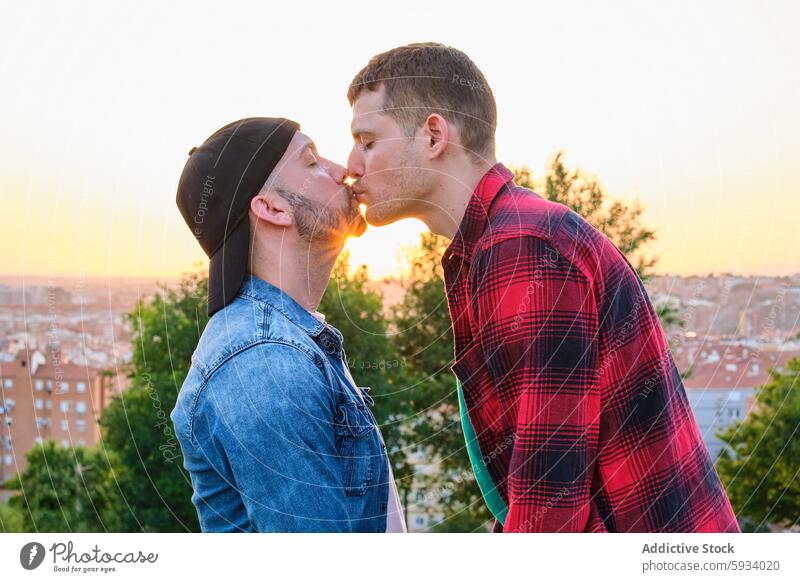 Gay couple shares a tender kiss at sunset love gay affection unity city background homosexual male intimacy romantic relationship bonding together tenderness