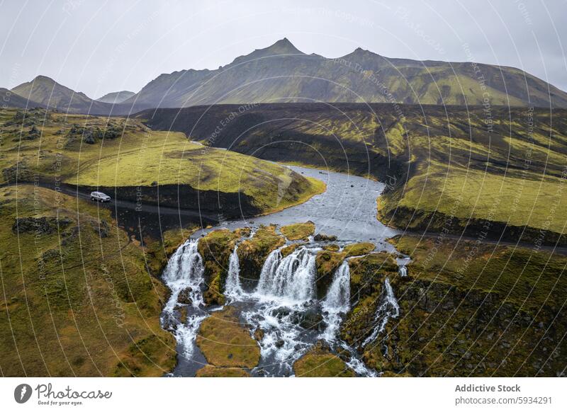 Scenic Iceland Highlands with Cascading Waterfalls iceland highland mountain river waterfall aerial view landscape nature travel scenery outdoor cascade rugged