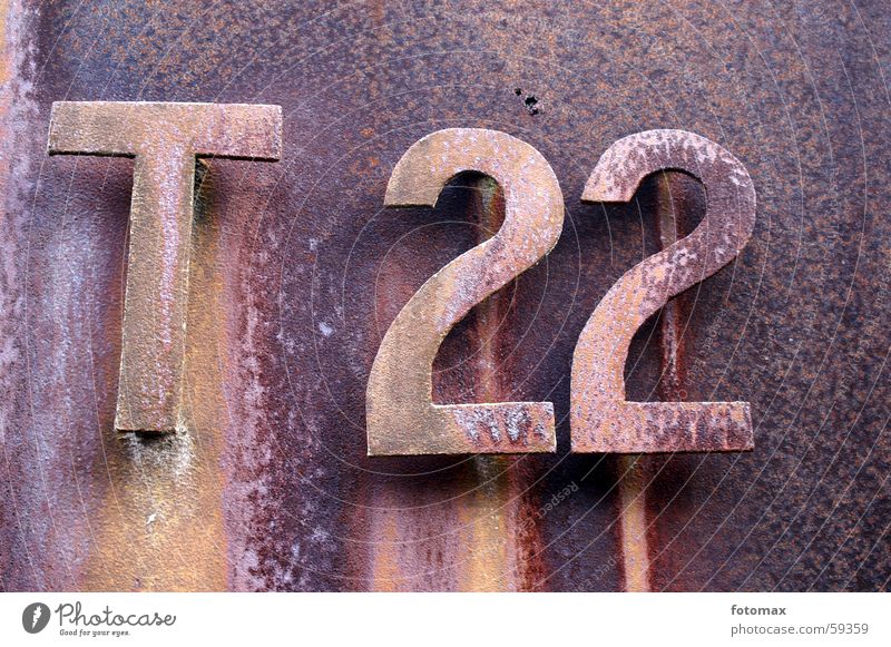 T 22 Digits and numbers Letters (alphabet) Iron Metal Rust Derelict
