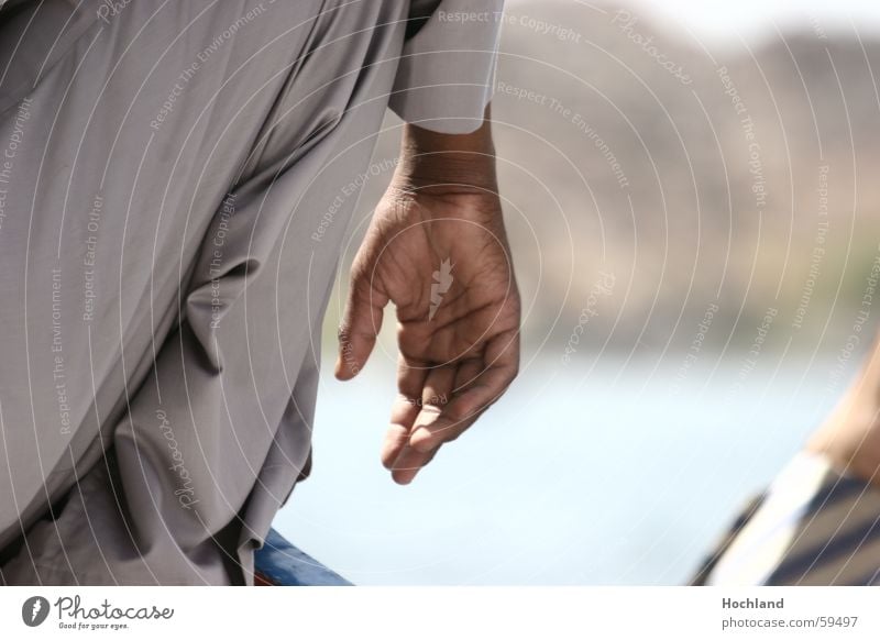 The dignity of the hand Hand Egypt Street Man Blur Fingers Thumb Passion caffetized Wrinkles Detail Parts of body Self-confident Determination Action Touch