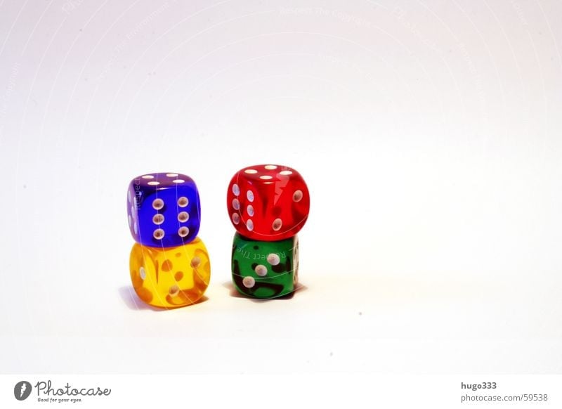 four stacked cubes harmonizing in front of a white background Playing Throw dice 4 Green Red Yellow Disaster Consecutively Eyes Blue Happy basic-coloured
