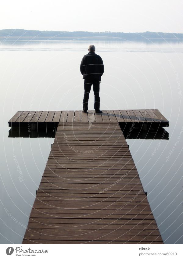 Man on T Footbridge Lake Wood Morning Calm Water Wooden board tomorrow at the lake Dawn Am Mellensee man by the water Relaxation