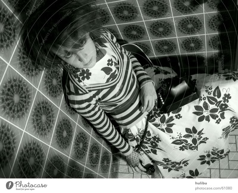 In the corner Girl Woman Telephone Seventies Sixties Multicoloured Stool Dress Striped Pattern Flower Toilet Tile Black & white photo Floor covering