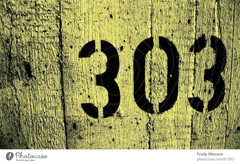 postcard no. 303 Background picture Wall (building) Wall (barrier) Surface Concrete Digits and numbers Yellow Black Parking garage Parking lot back wall Amount