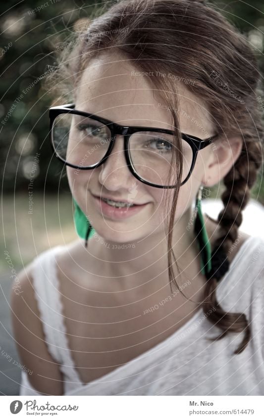 speculative iron Lifestyle Feminine Girl Skin Face 1 Human being 8 - 13 years Child Infancy T-shirt Eyeglasses Brunette Long-haired Braids Joy Happiness Cute