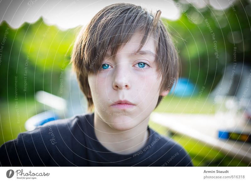 Portrait Human being Masculine Youth (Young adults) 1 13 - 18 years Child Nature Summer Garden Brunette Sit Authentic Simple Uniqueness Positive Blue Green