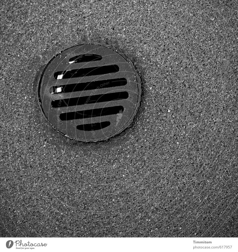 Mysterious Black Hole. Hollow Pipe Opening Grating Metal Wait Esthetic Dark Silver Precision Firm Stability Asphalt Black hole Black & white photo Exterior shot