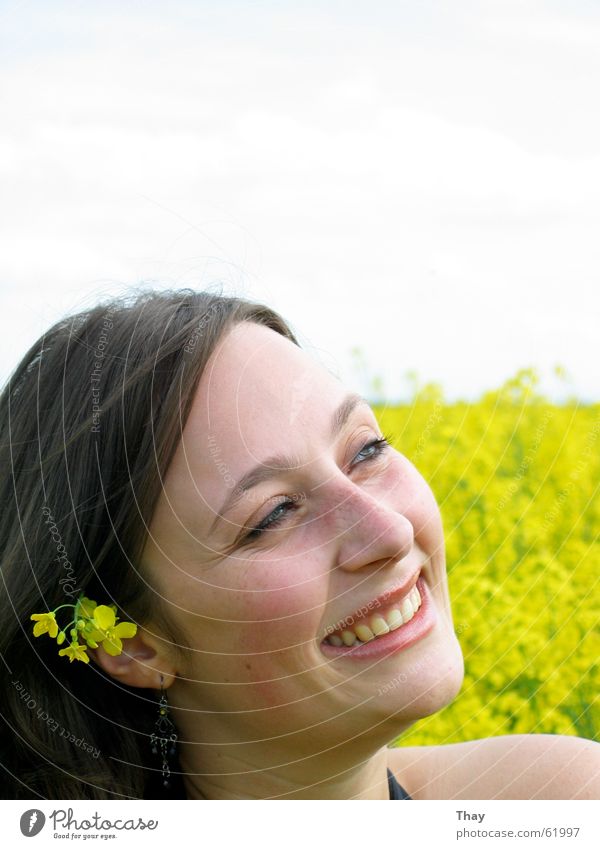 flower child Canola Flower meadow Field Yellow Portrait photograph Exterior shot Woman Brunette Happy Laughter Joy