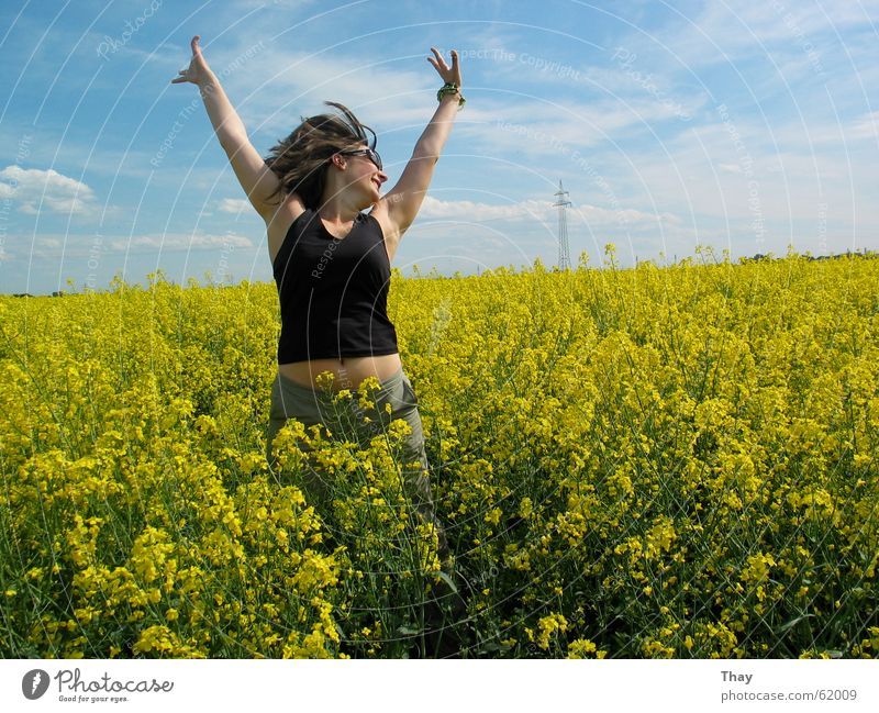jump to heaven Jump Woman Canola Field Yellow Meadow Flower Summer Exterior shot Joy Happy