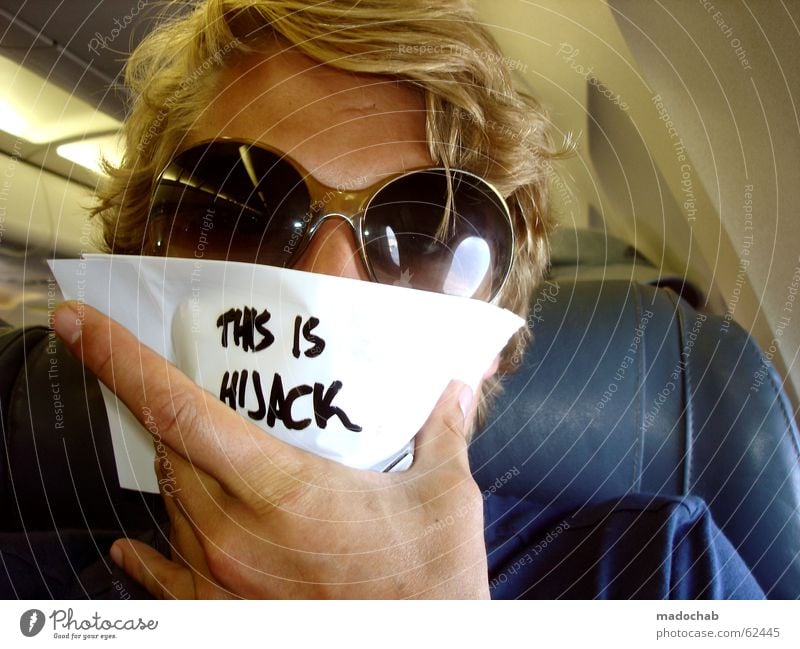 HIJACK ME | terrorist self kidnapping fun airplane passenger Airplane Kidnap Sunglasses Human being Portrait photograph Blonde Typography Lifestyle Terror