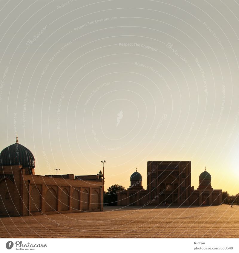 Mosque towers in evening sun in Uzbekistan | Asia Vacation & Travel Tourism Far-off places Freedom Sightseeing City trip Summer Cloudless sky Horizon Sunrise