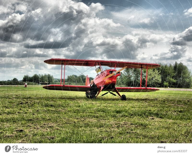 He and his plane. Airplane Pilot Red Clouds Meadow Double-decker bus Old Flying Sky