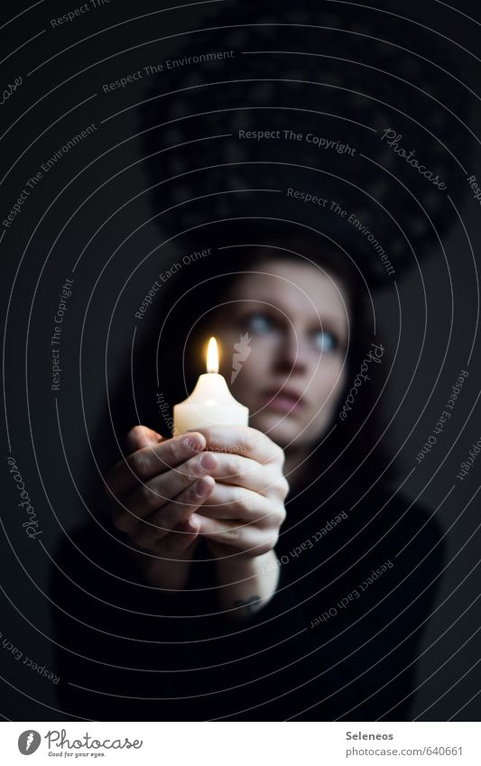 candlesticks Senses Calm Meditation Human being Feminine Woman Adults Face Hand Fingers 1 Illuminate Dream Sadness Dark Near Warmth Concern shoulder stand