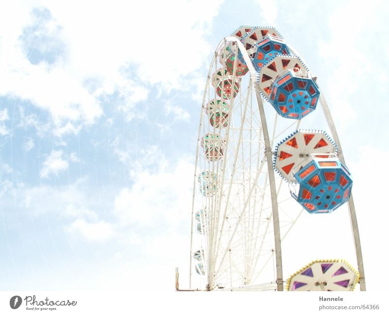 Between heaven and earth Clouds Ferris wheel Fairs & Carnivals Festival White Background picture Unclear Sky Feasts & Celebrations Joy Intersection Blur
