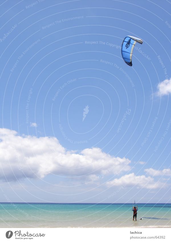 kitesurf Kiting Rip Surfing Beach Ocean Kiter Fuerteventura Aquatics Clouds Aerodynamics Bathing place Freedom Masculine Anxious Gust of wind Sunbathing Darken