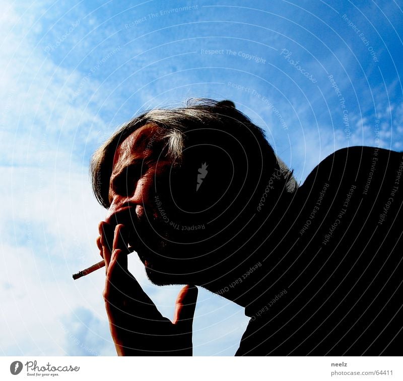 Blue behind the face Sky blue Man Hand Silhouette Cigarette Smoking Looking Contentment Contrast Head Profile