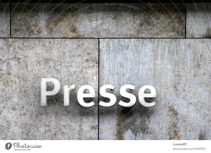 Press Colour photo Exterior shot Print media Stone Metal Characters Purity Stone wall Letters (alphabet)