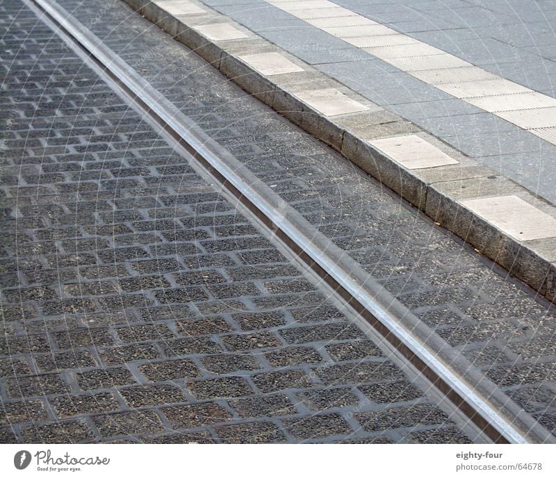 track_study_03 Asphalt Concrete Railroad tracks Tram Driving Transport Gray Curbside Street Cobblestones eighty-four Lane markings