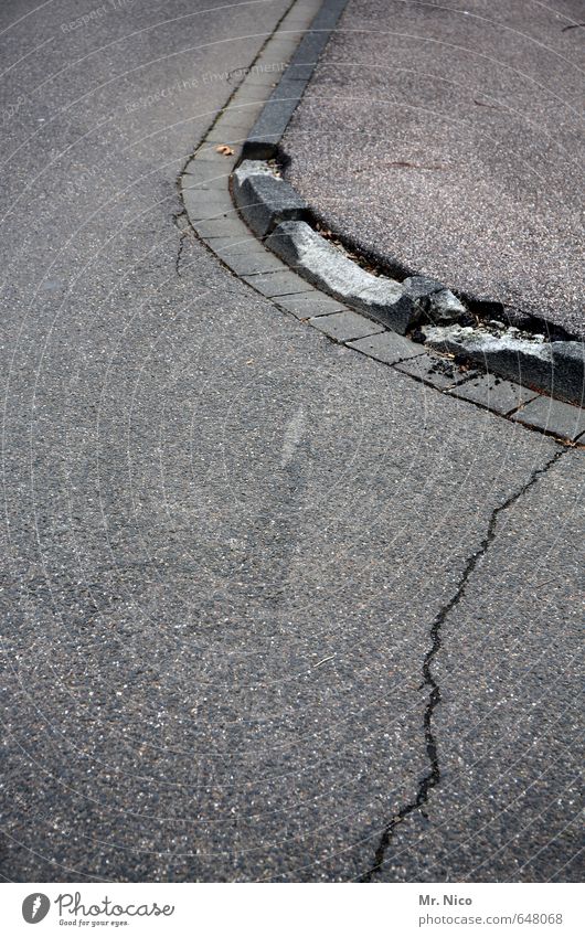 collateral damage Town Road traffic Street Lanes & trails Broken Gray Curbside Sidewalk Crack & Rip & Tear Asphalt Curve Concrete Round Decline Motoring
