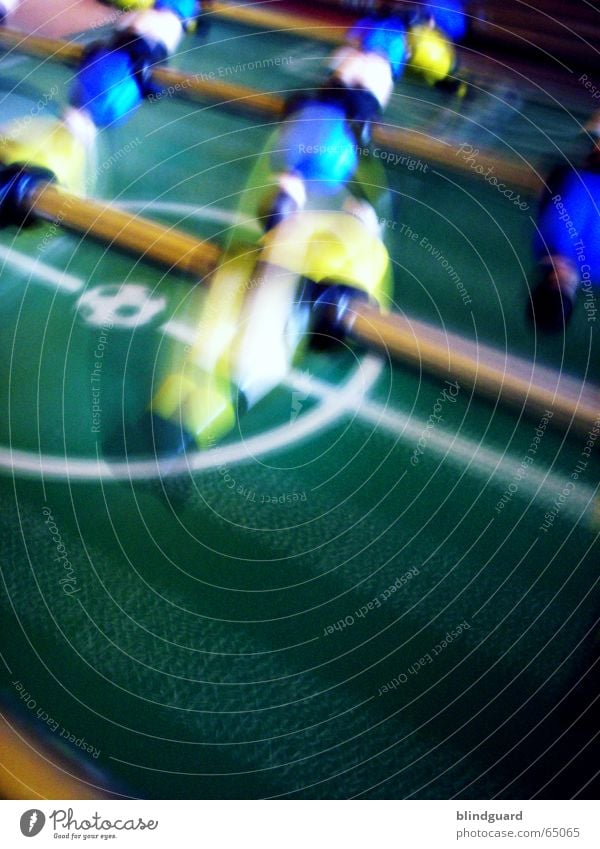 I'm freaking out. Table soccer Rotate Playing Leisure and hobbies Green Yellow Sports Blue Movement Rod Motion blur Rotation Rotated Blur Speed Colour photo