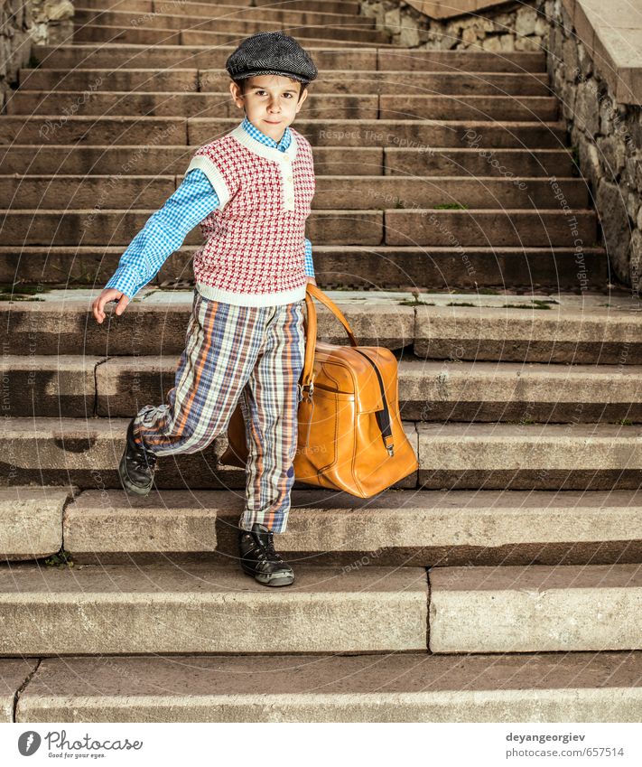Exterior stairs and child with vintage bag Vacation & Travel Trip Child School Human being Boy (child) Infancy Street Suitcase Small Retro Black White kid
