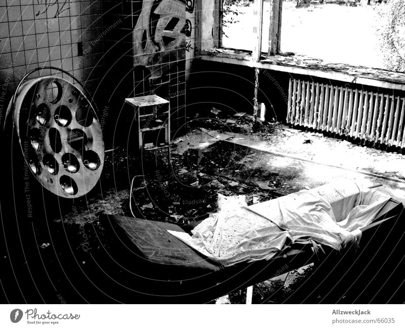 The Black and White Clinic Surgery Sanatorium Dark Dirty Hospital Smeared Disgust Rain Broken Shard Building rubble Couch Ruin Untidy Interior shot Creepy Tile