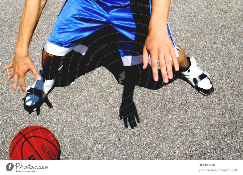 back and forth Dribbling Playing Hand Pants Asphalt Basketball streetball move Movement Sports Joy Sun Shadow Ball Blue