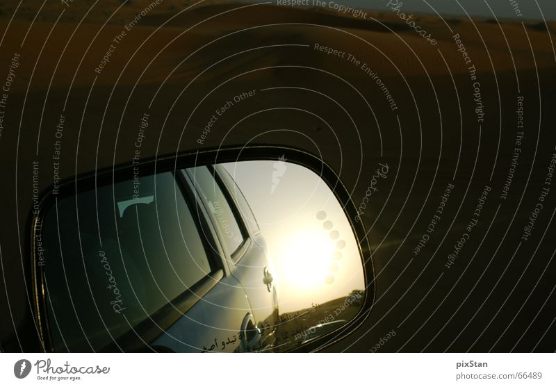 objects in the mirror are closer than they appear..... Rear view mirror Mirror Arabia Dubai Sunset Car Characters Desert Sand Evening