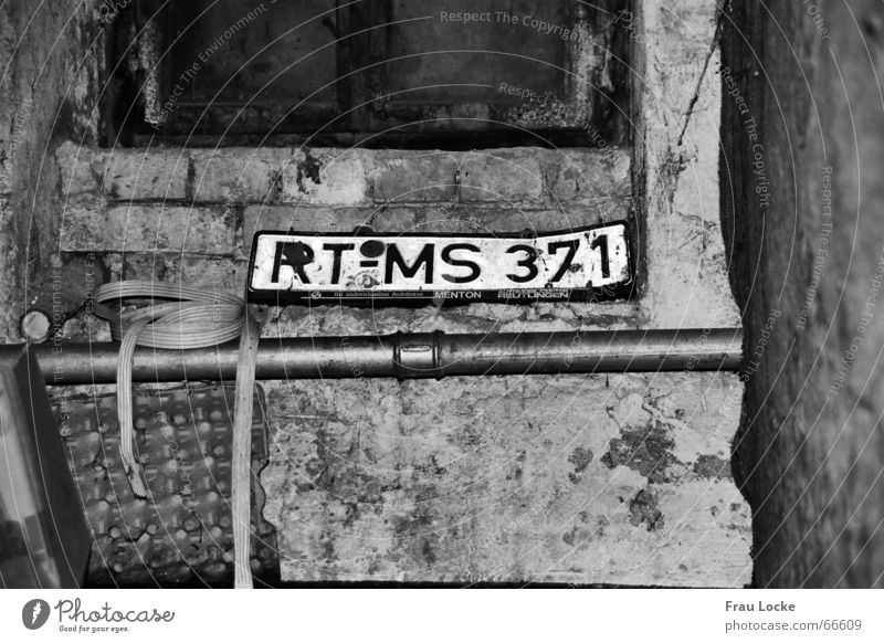 deep-down Cellar Small room Number plate Garage Motor vehicle Dark Cellar window rt Reutlingen card Signs and labeling