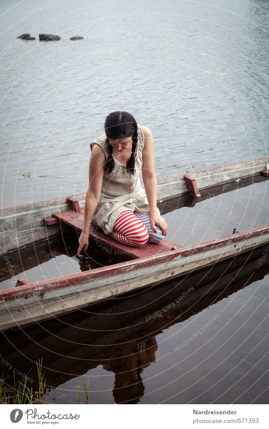 In thought... Lifestyle Harmonious Senses Relaxation Calm Meditation Human being Woman Adults 1 Water Lake Rowboat Watercraft Dress Black-haired Long-haired