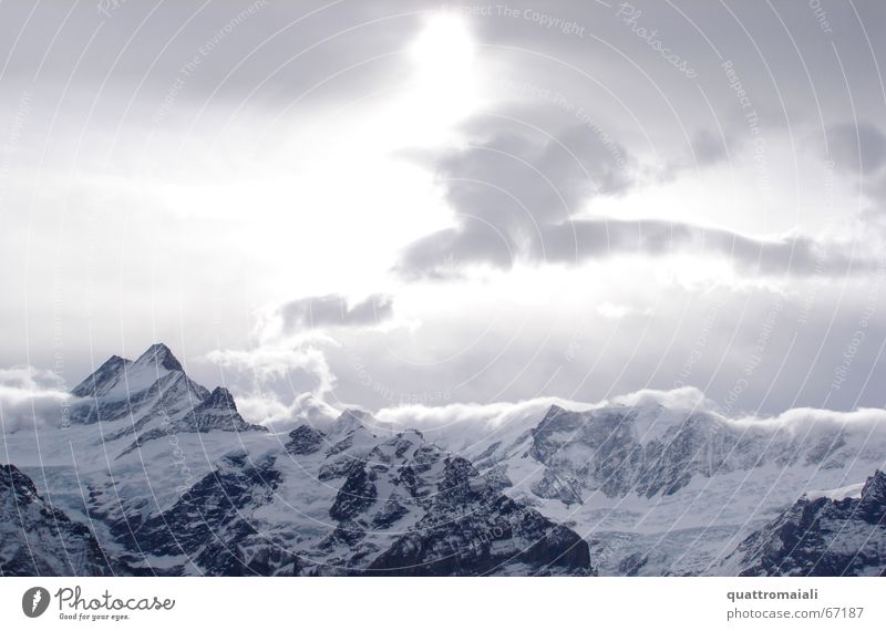 winter sun Winter Clouds Peak Grindelwald Switzerland Light Cold Glacier Sun Alps Snow difuse light Mountain Rock Ice