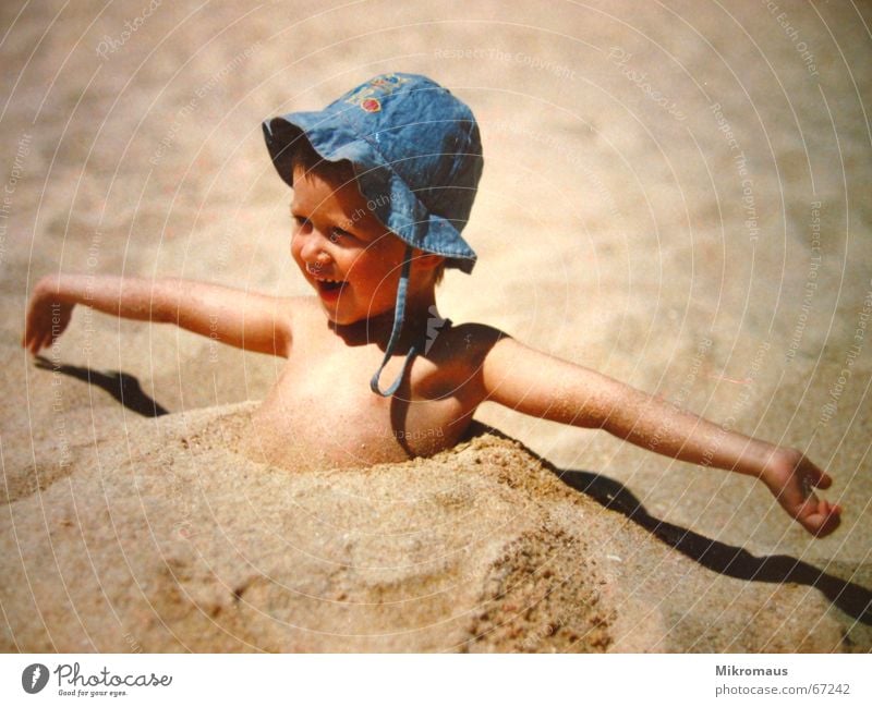 Summer is here Joy Sand Hat Laughter Happiness Beach Vacation & Travel Travel photography Relaxation Sandy beach Coast Playing Bury Muding Weather protection