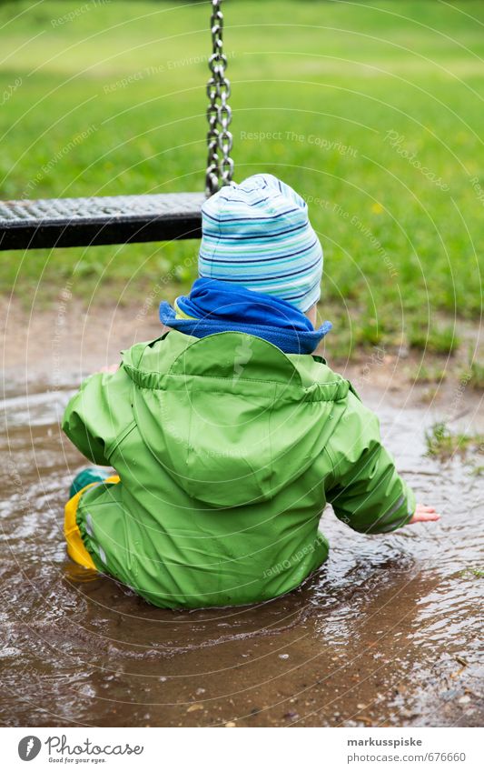 child sits in puddle Leisure and hobbies Playing Trip Adventure Summer Parenting Education Kindergarten Child Swing Playground Meadow daycare house