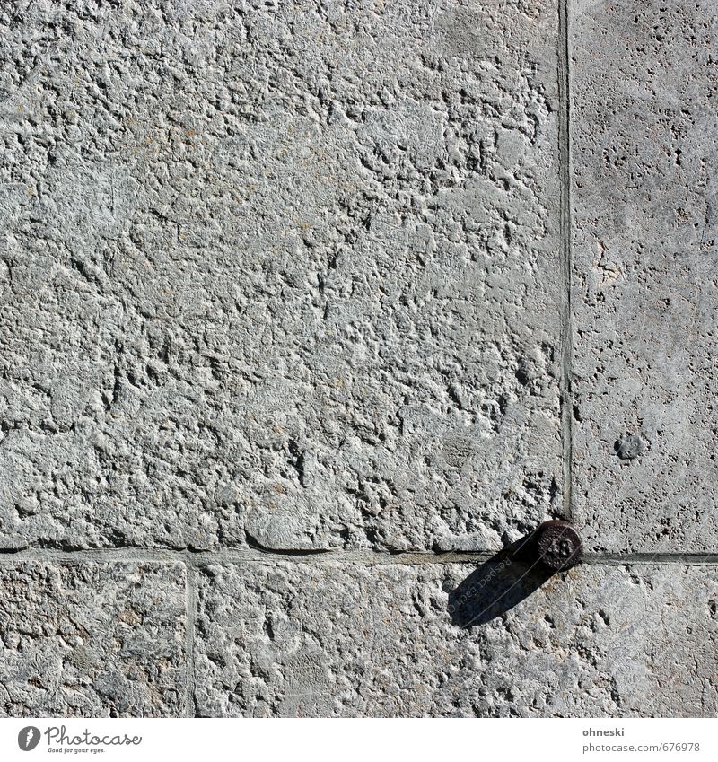 48 Manmade structures Building Wall (barrier) Wall (building) Facade Stone Digits and numbers Gray Seam Colour photo Subdued colour Exterior shot Abstract