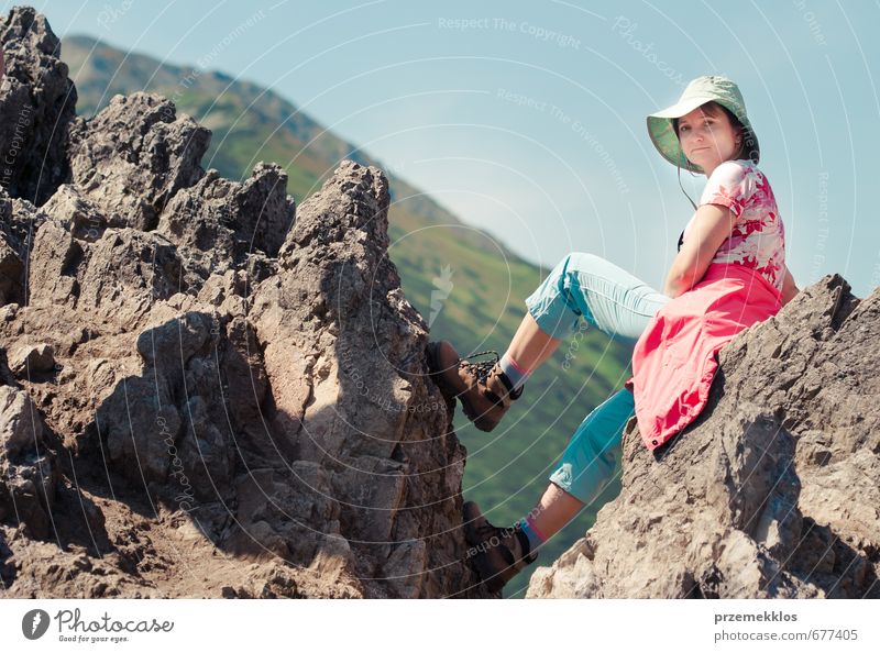 Woman sitting on mountain peak Relaxation Vacation & Travel Tourism Trip Adventure Sightseeing Mountain Hiking Sports Climbing Mountaineering Adults