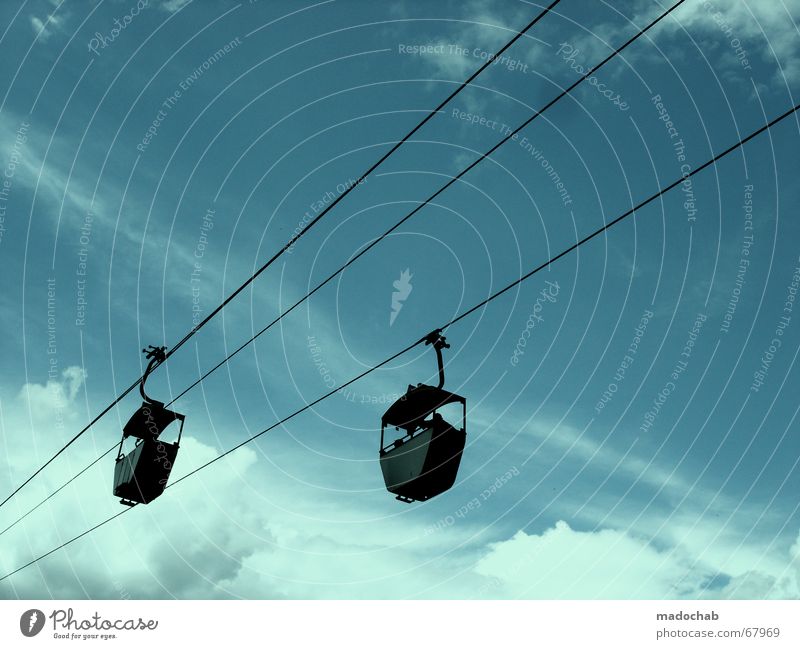 RACE IN BLUE Suspension railway Cable car Clouds Sky Trip Direction Beautiful weather Gondola 2 In pairs Isolated Image Bright background Clouds in the sky