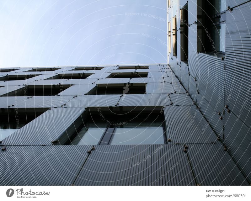 on the edge of architecture Office building Facade Building Window Vanishing point Worm's-eye view Symmetry Concrete Steel Corner Manmade structures Part