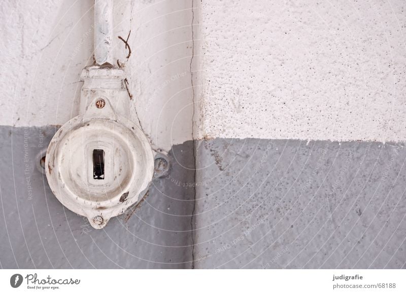 Old switch Divorce Past Switch Electricity Light Wall (building) Plaster Gray Black Relationship Lovesickness End from 1 Energy industry Colour Cable