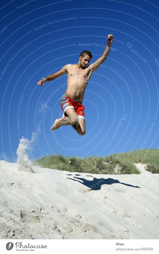To infinity... and much further Jump Summer Beach Man Swimming trunks Youth (Young adults) Superman Ocean Vacation & Travel Flying Sky Beach dune Sand