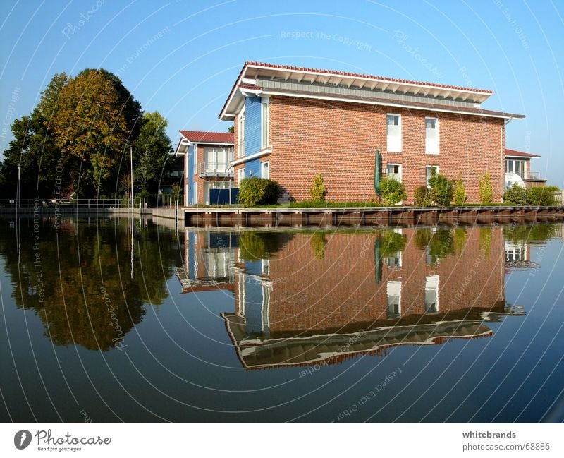Blue reflection House (Residential Structure) Lake Calm Relaxation Reflection Vacation & Travel Tree Jetty Watercraft Vacation mood Sky New Harbour