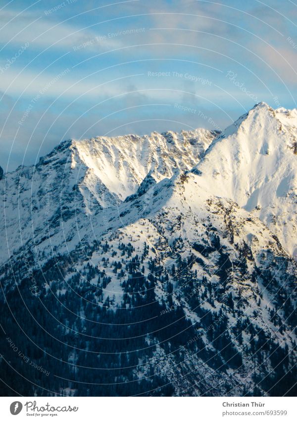 Nice view Environment Nature Landscape Sky Clouds Winter Beautiful weather Snow Alps Mountain Peak Snowcapped peak Esthetic Positive Blue Gray Black White