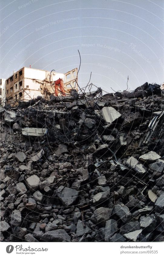 Collapsing new buildings (the second) Dismantling Construction worker House (Residential Structure) Excavator Concrete Construction site Fence