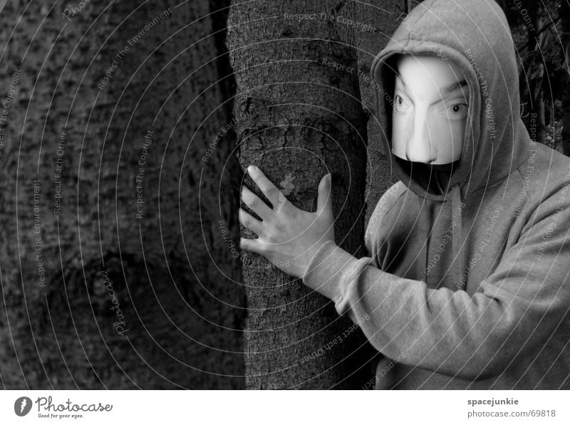 the man behind the mask Man Threat Eerie Forest Tree Ambush Mask Human being Face Hide Hiding place Behind