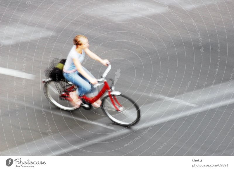 bike in motion Bicycle Woman Transport Traffic lane Street Movement Mixture Lanes & trails traffic Cycling
